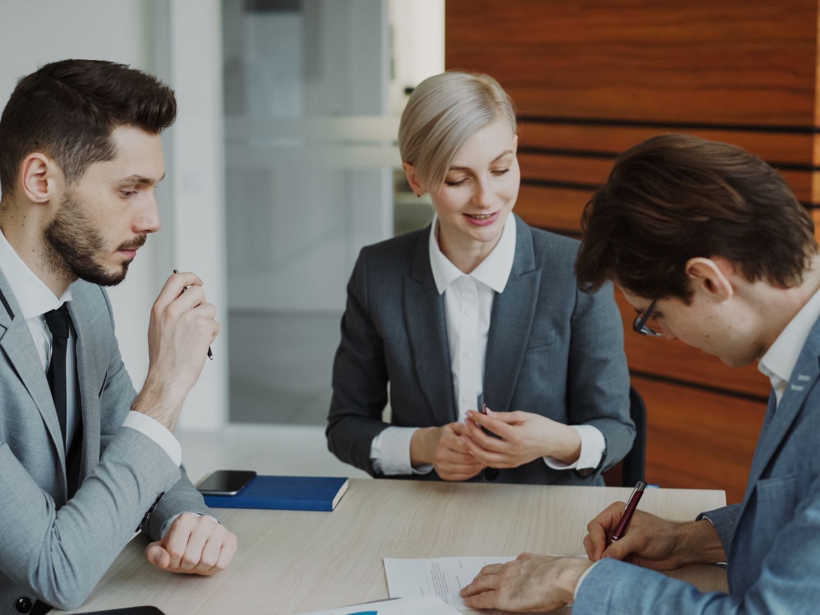 Category team reviewing market strategy in a meeting